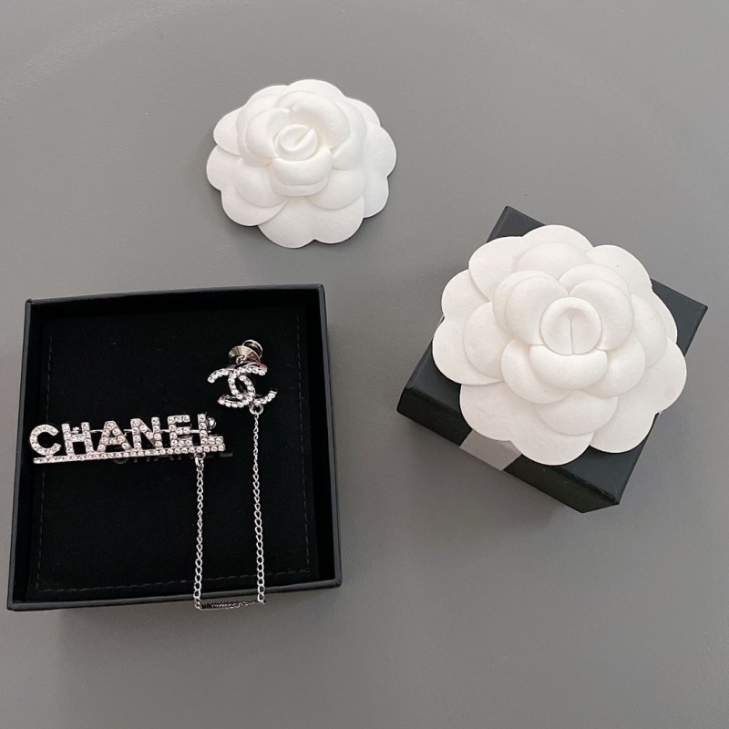 Ch*el brooches